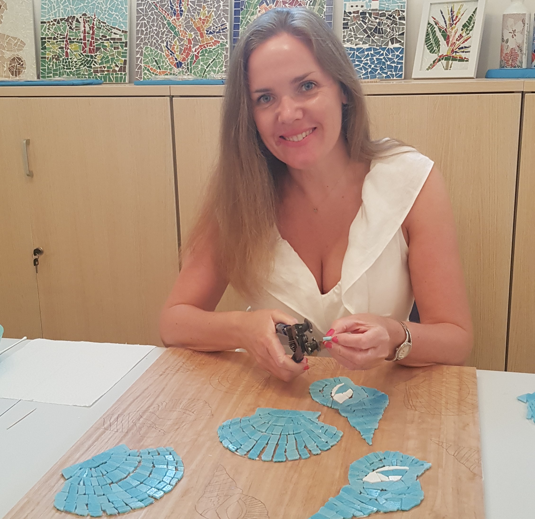 Karen working on a mosaic commission
