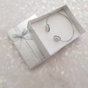Bangle with White Metallic Glass