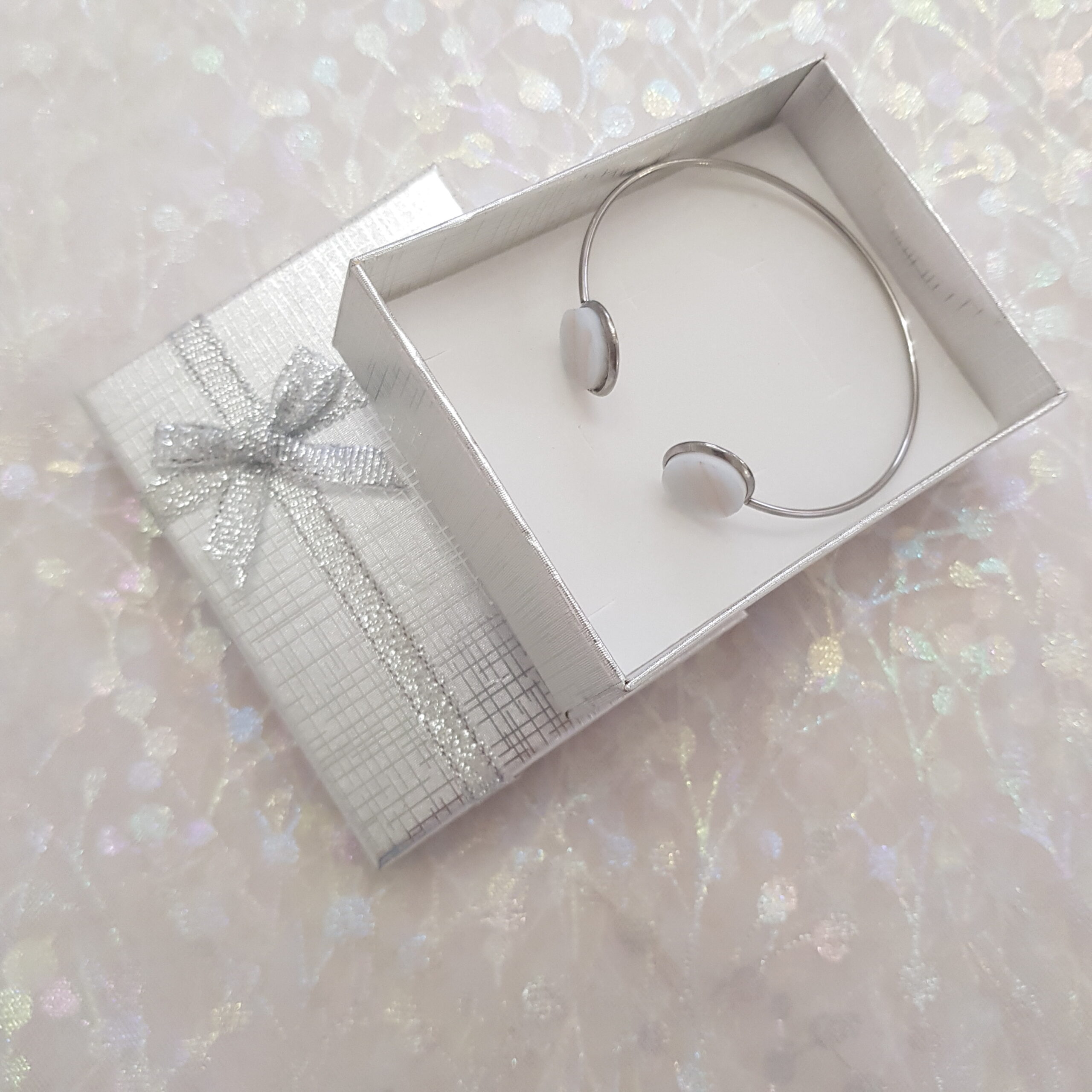 Bangle with White Metallic Glass